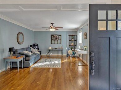Tiled entry foyer open to formal living room used 