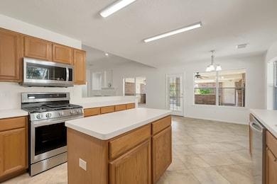 Stainless steel appliances, breakfast room