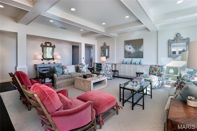 Living room with beam ceiling, and recessed lighting