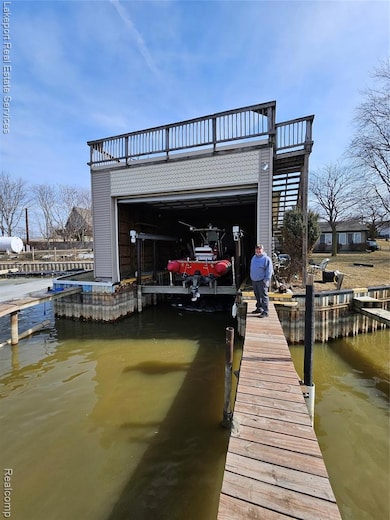 Dock featuring a water view