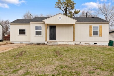View of front of house with a front yard, crawl sp