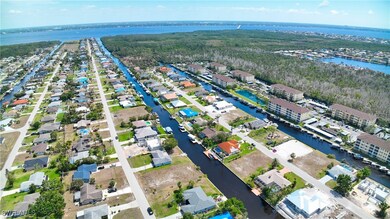 Aerial perspective of suburban area with a nearby