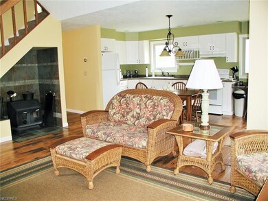 View of the open floor concept. Wood burner is per