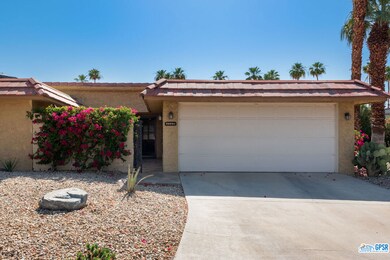 Front view with 2 car garage