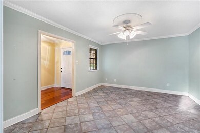 Formal Living Rm w/double doors to the Den.