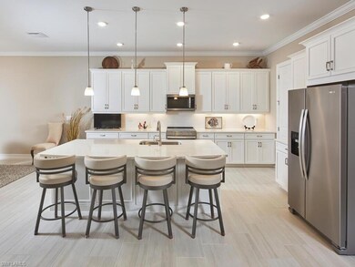 The well-equipped kitchen features stainless steel