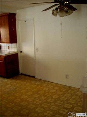 Dining room next to kitchen.
