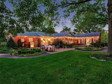 AND NOW TO THE BACKYARD OASIS. HERE YOU CAN SEE ALL THE WONDERFUL WINDOWS, AND BRICK PATIO AND GARDEN AREAS.  IT'S BEAUTIFUL DAY AND NIGHT IN EVERY SEASON.