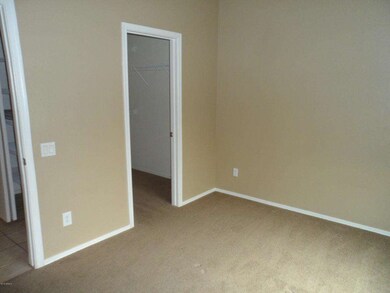BEDROOM DOWN W/ WALK IN CLOSET