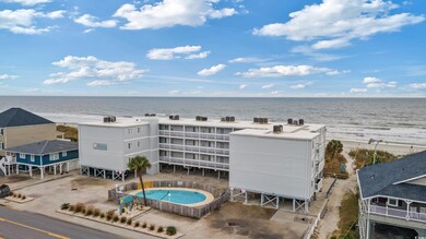 Aerial view with a beach view and a water view