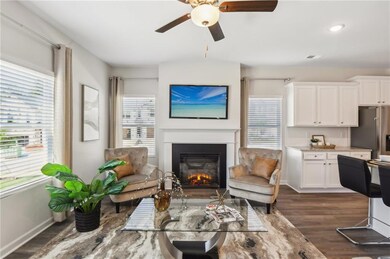 Living room featuring dark wood finished floors, a