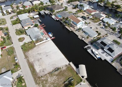 Drone / aerial view with a water view and a reside