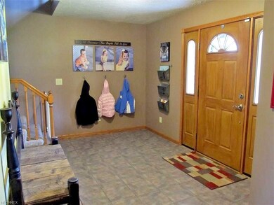 The foyer is a nice size measuring 15x9 and featur