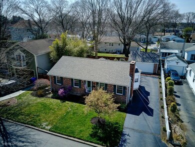 The home is surrounded by beautifully maintained p