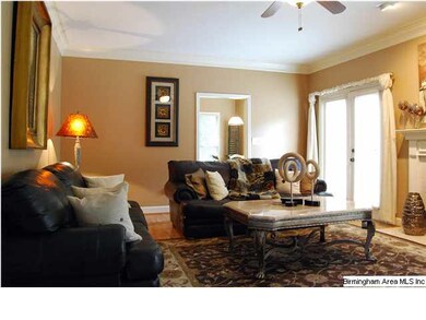 2nd view of den with 2 sets of French doors