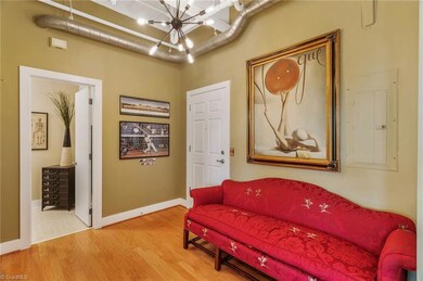 Entry door. Guest half bath on the left.