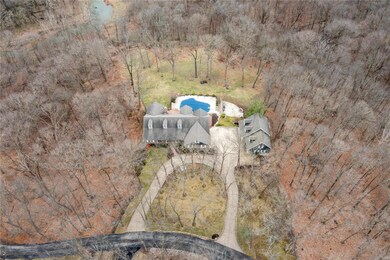 Aerial view of home, carriage house, inground, sal