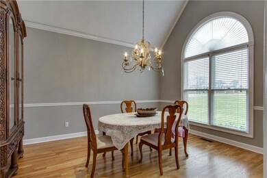 Formal Dining Room - Vaulted Ceiling w/ Crown Molding and Hardwood flooring.