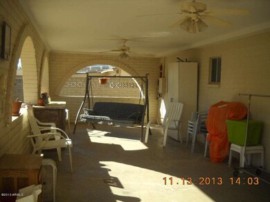 covered patio featuring 2 ceilings fans