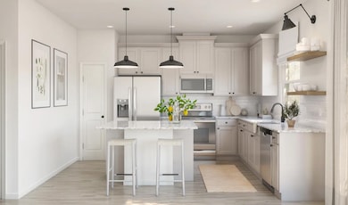 Kitchen with pendant lighting & floating shelves
