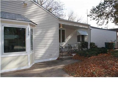 Covered front porch. Low maintenance siding.