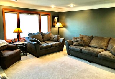 Large Pella window is beautiful accent to the larg