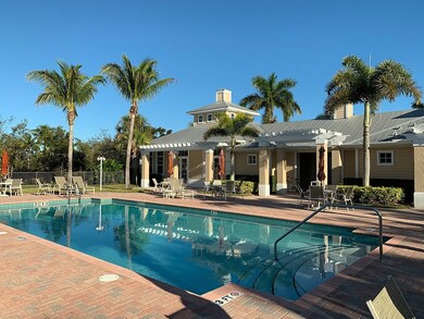 Large community pool with clubhouse, steps from ho