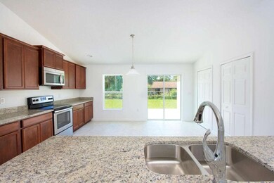 Elizabeth Kitchen Island Looking at Slid