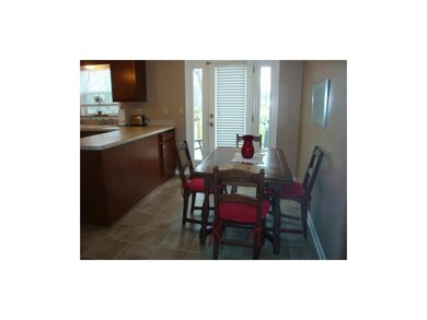 Country kitchen with deck access