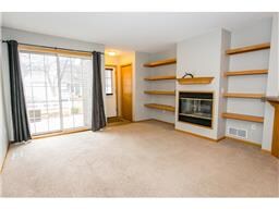 Good sized main floor living space with gas burnin