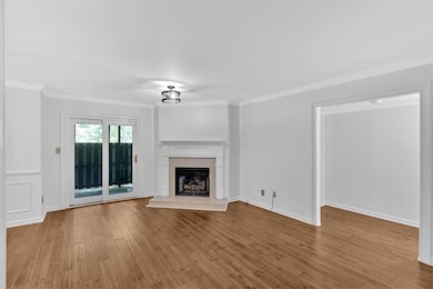 Unfurnished living room featuring a fireplace with
