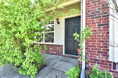 Front porch, canopy of greenery for privacy.  Can