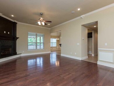 Living Room. Cozy up to a easy clean corner gas log fireplace