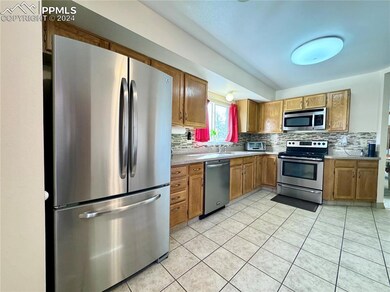 Kitchen was renovated to have solid counters, stai