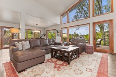 Living Room with automated UV shade/window coverin
