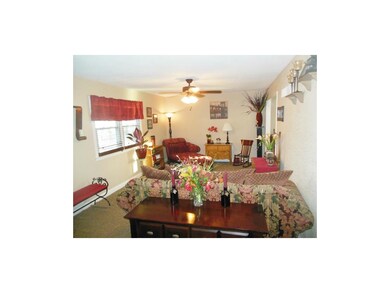 Formal Living Room with New Carpet, Ceiling Fan an