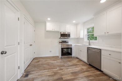 Kitchen with appliances with stainless steel finis