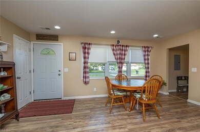 Dining area near entrance from garage and main ent