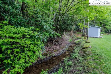 Creek runs along the back.