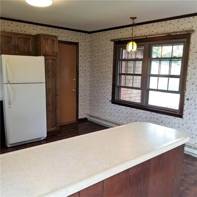 kitchen counter and door to attached garage and la