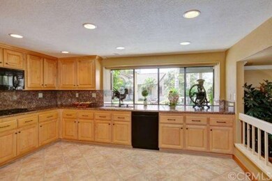 Large Open kitchen area with granite counters, bui