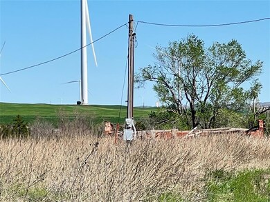 View of yard with a rural view