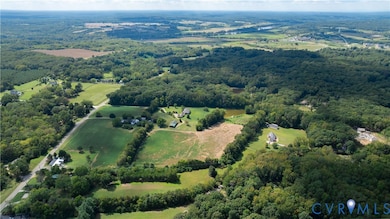 Aerial view of property and surrounding area featuring rural​​‌​​​​‌​​‌‌​​​‌​​‌‌​​‌‌​‌​​​‌‌​​‌​​​​​‌ landscape