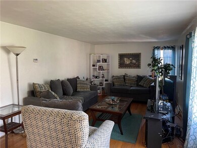 Front apartment living room with hardwoods