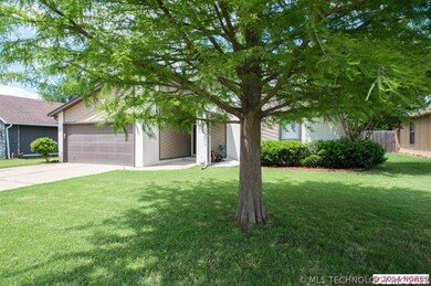 Beautiful shade tree in front yard.
