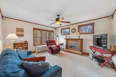 Sitting room located on the main level. Gas fireplace!