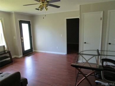 Living room looking to master bedroom with two clo