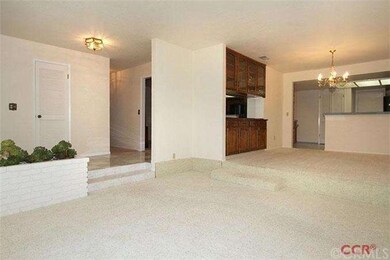 Living, entry and dining areas.