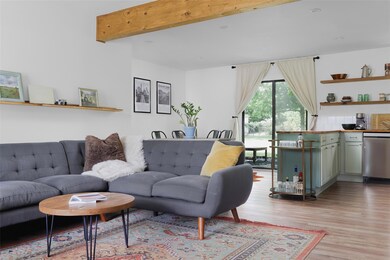Living area featuring light wood finished floors