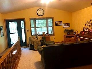 Front door, living room with bay window